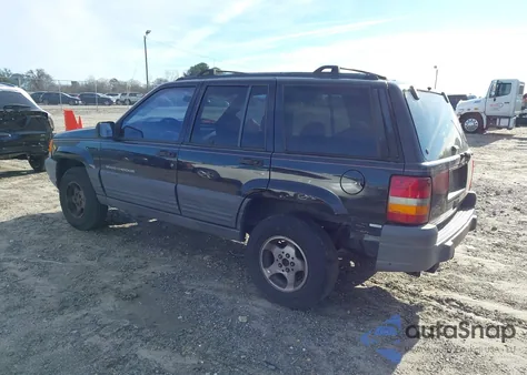 1997 Jeep Grand Cherokee Laredo/Tsi из США, поврежденный, VIN 1J4FX58SXVC567471